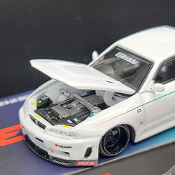 Kaido House x Mini GT Nissan Skyline GT-R (R33) GReddy GR33 V1 - 1:64, White (2024 Limited Edition)