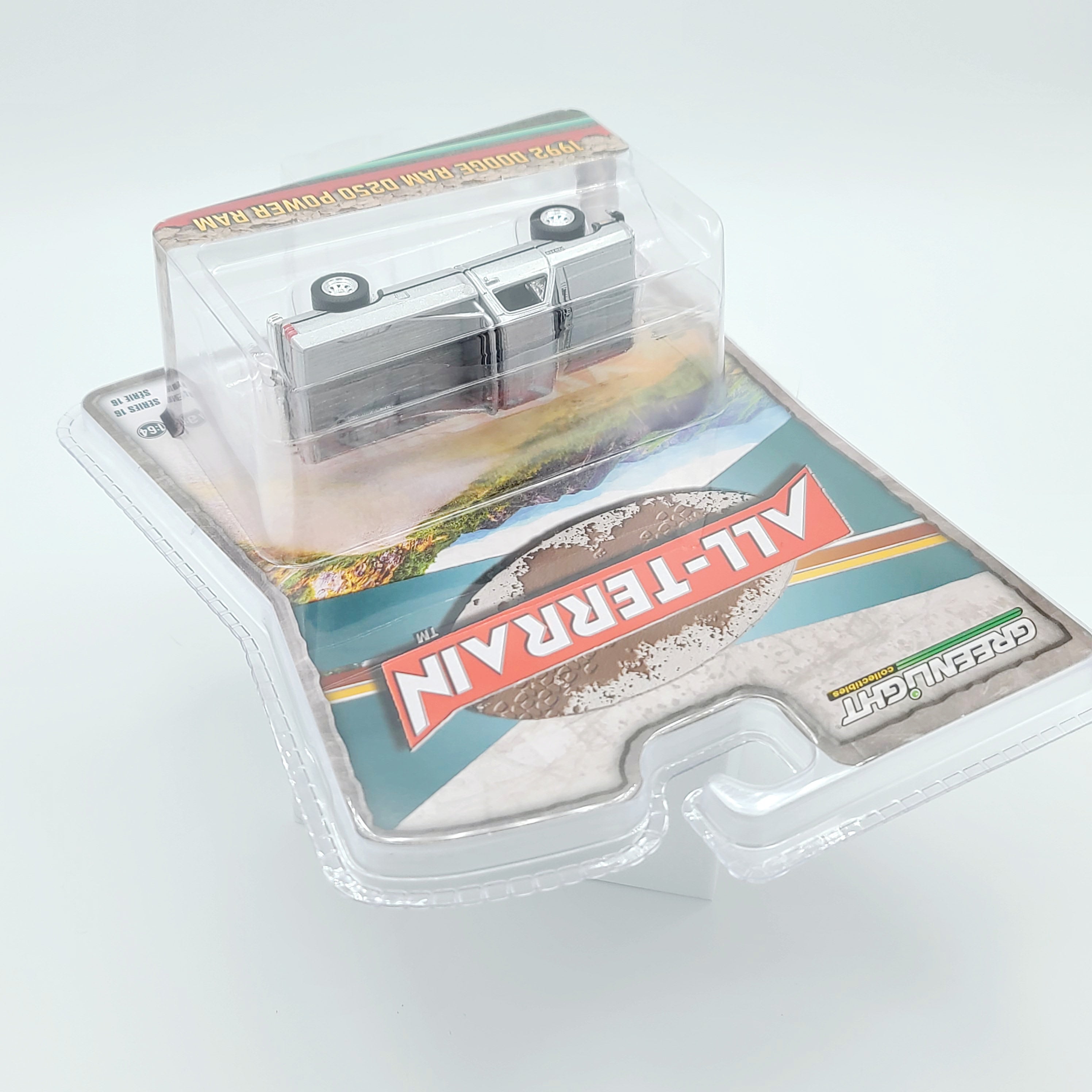 GreenLight '92 Dodge Ram D250 Power Ram Lifted w/ Rollbar - 1:64 scale, Sterling Silver (2024 All Terrain Series 16)