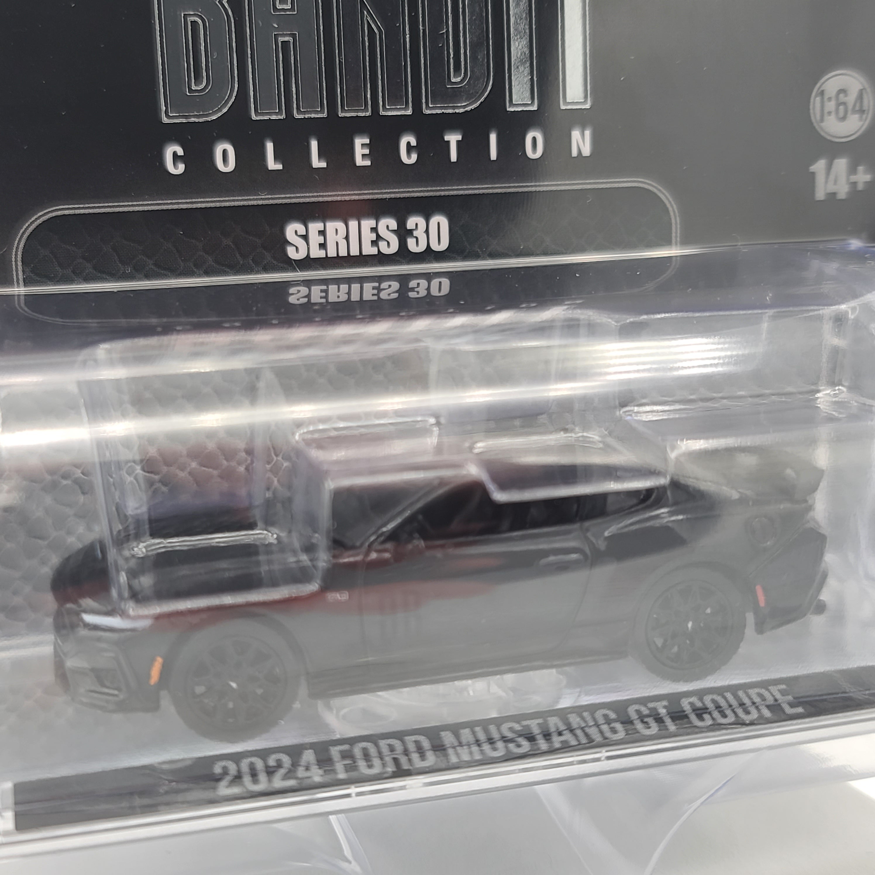 GreenLight '24 Ford Mustang Gen 7 5650 GT Coupe - 1:64 (2025 Black Bandit Series 30)