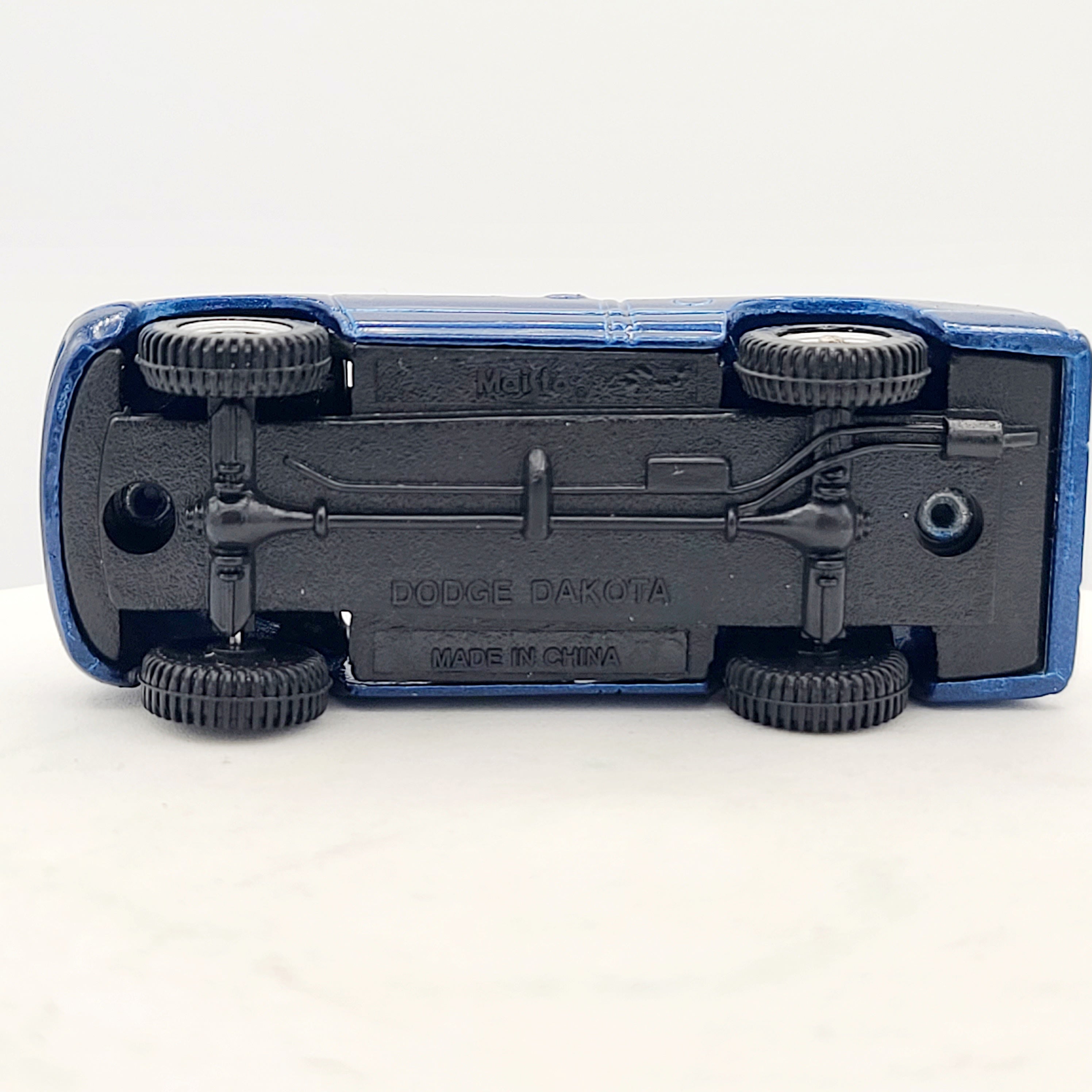 Maisto Dodge Dakota Sport Pickup Truck - Approx. 1:64, Blue (Speed Wheels / Road & Track)