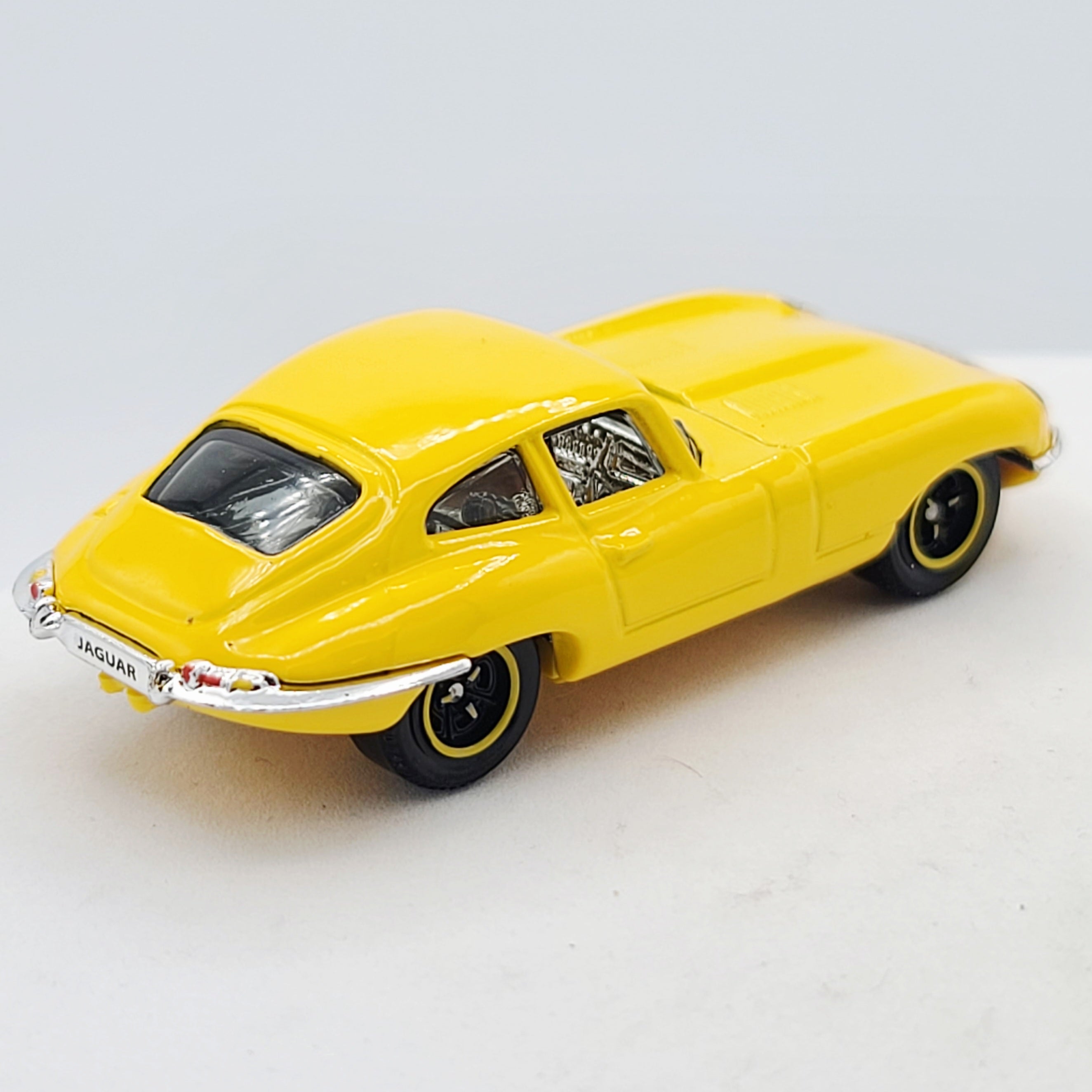 Matchbox '61 Jaguar E-Type Coupe - Yellow (2009 MBX Basic - Heritage Classics)
