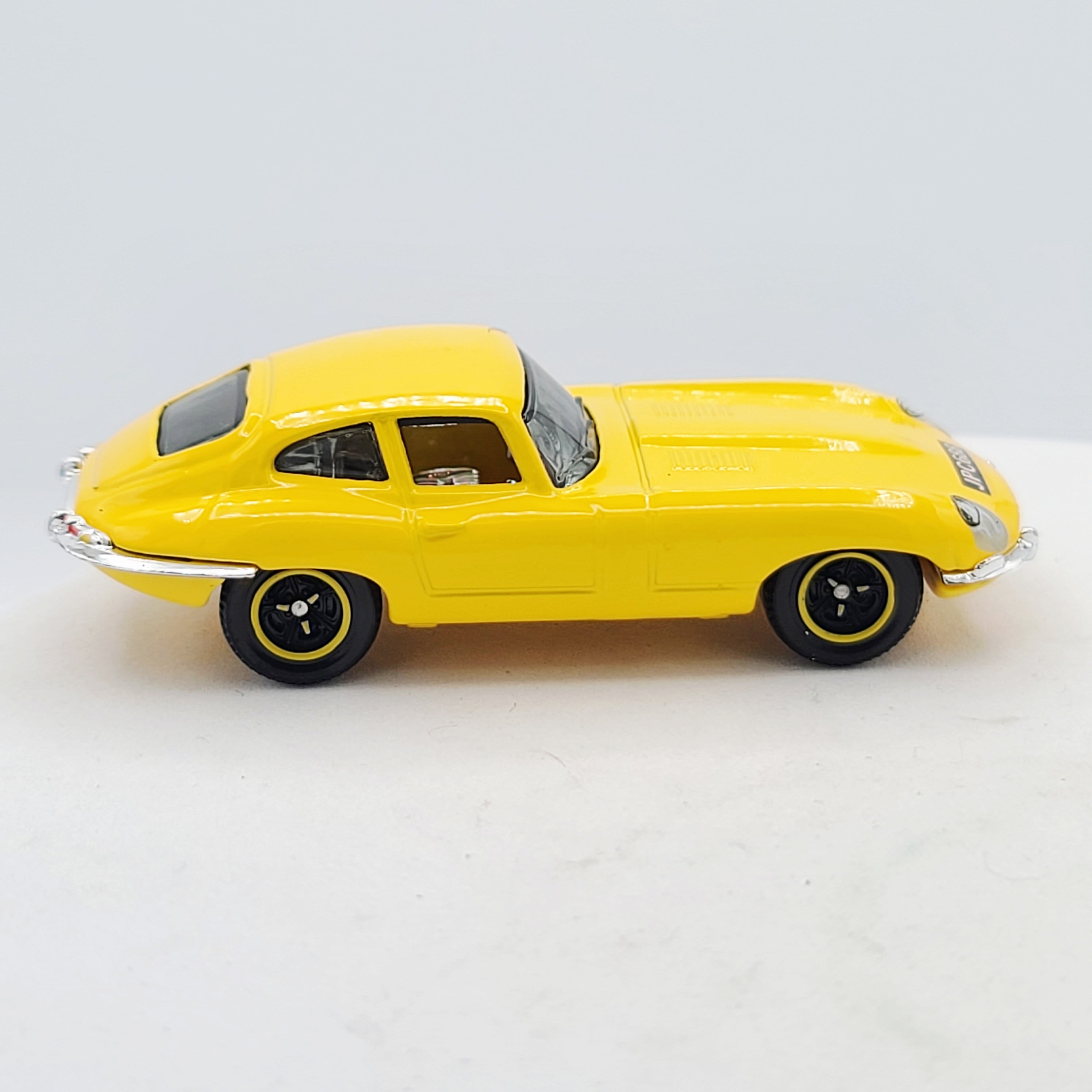 Matchbox '61 Jaguar E-Type Coupe - Yellow (2009 MBX Basic - Heritage Classics)