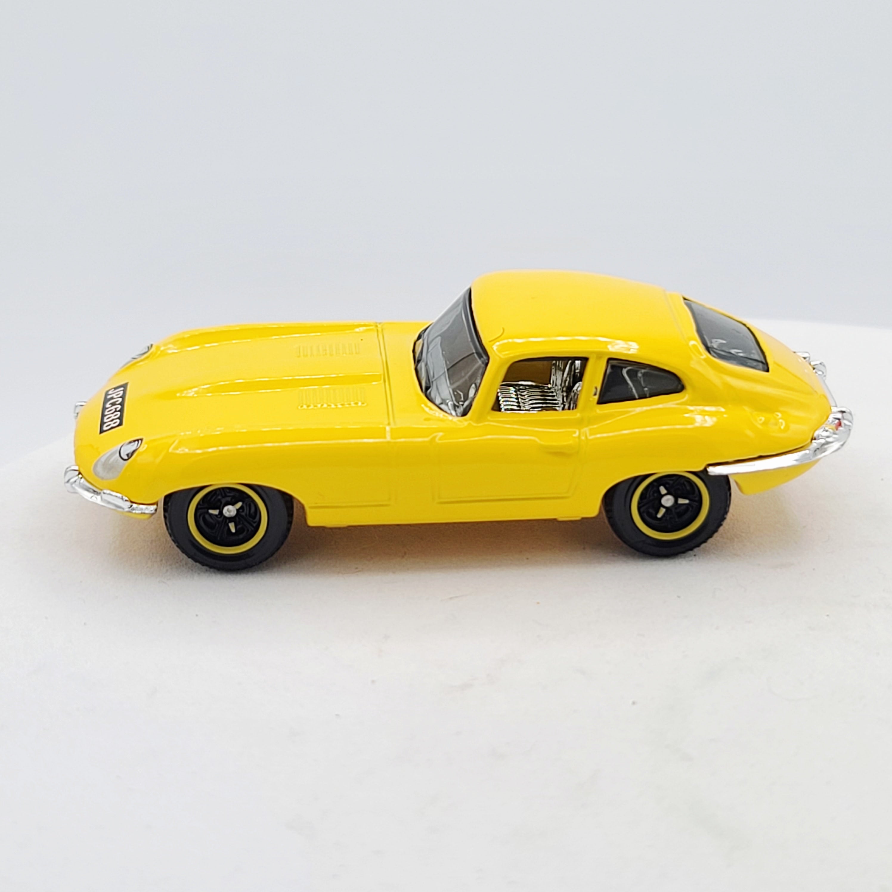 Matchbox '61 Jaguar E-Type Coupe - Yellow (2009 MBX Basic - Heritage Classics)