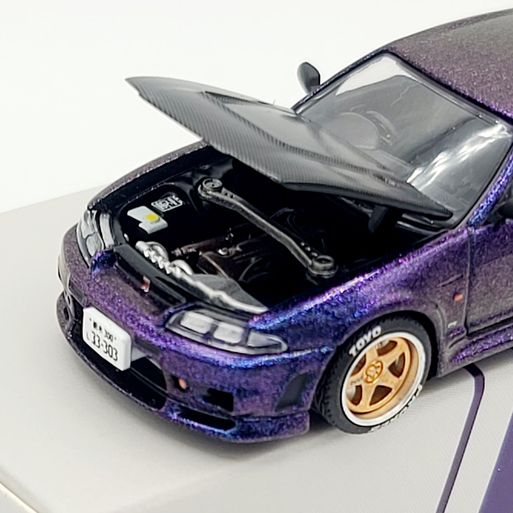 Pop Race Nissan Skyline GT-R R33 - 1:64, Midnight Purple (2026 Limited Edition)