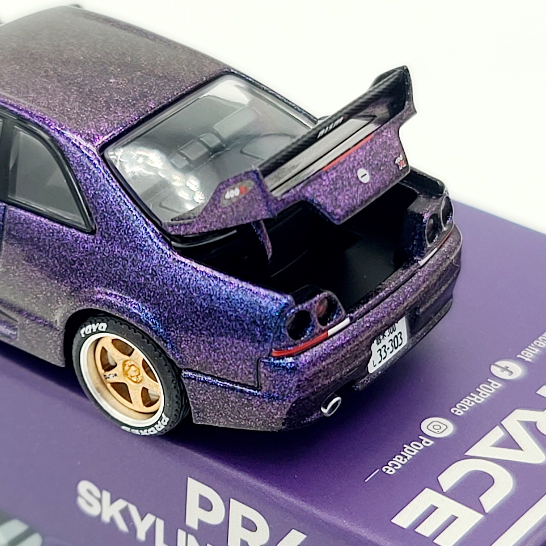 Pop Race Nissan Skyline GT-R R33 - 1:64, Midnight Purple (2026 Limited Edition)