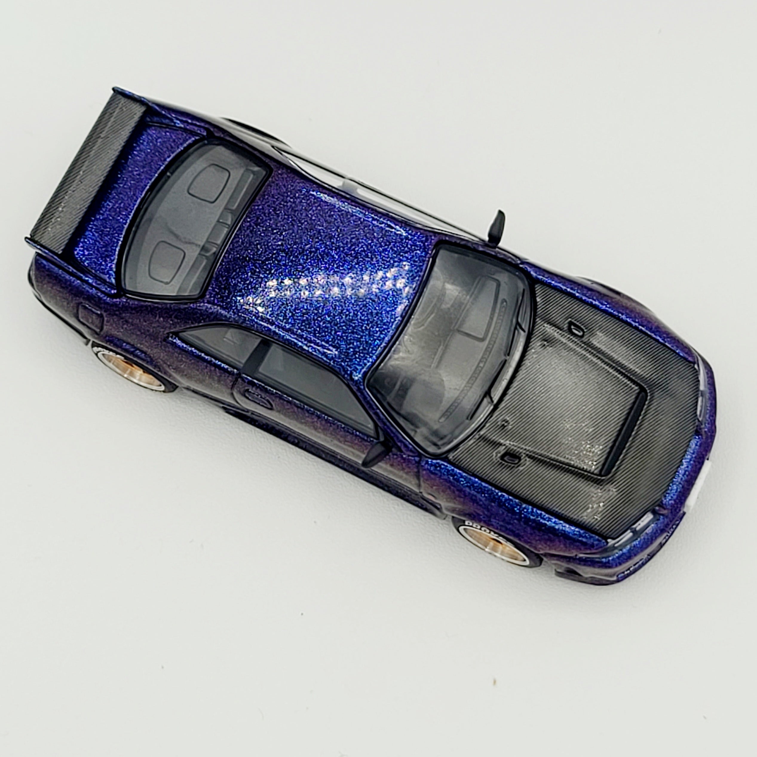Pop Race Nissan Skyline GT-R R33 - 1:64, Midnight Purple (2026 Limited Edition)