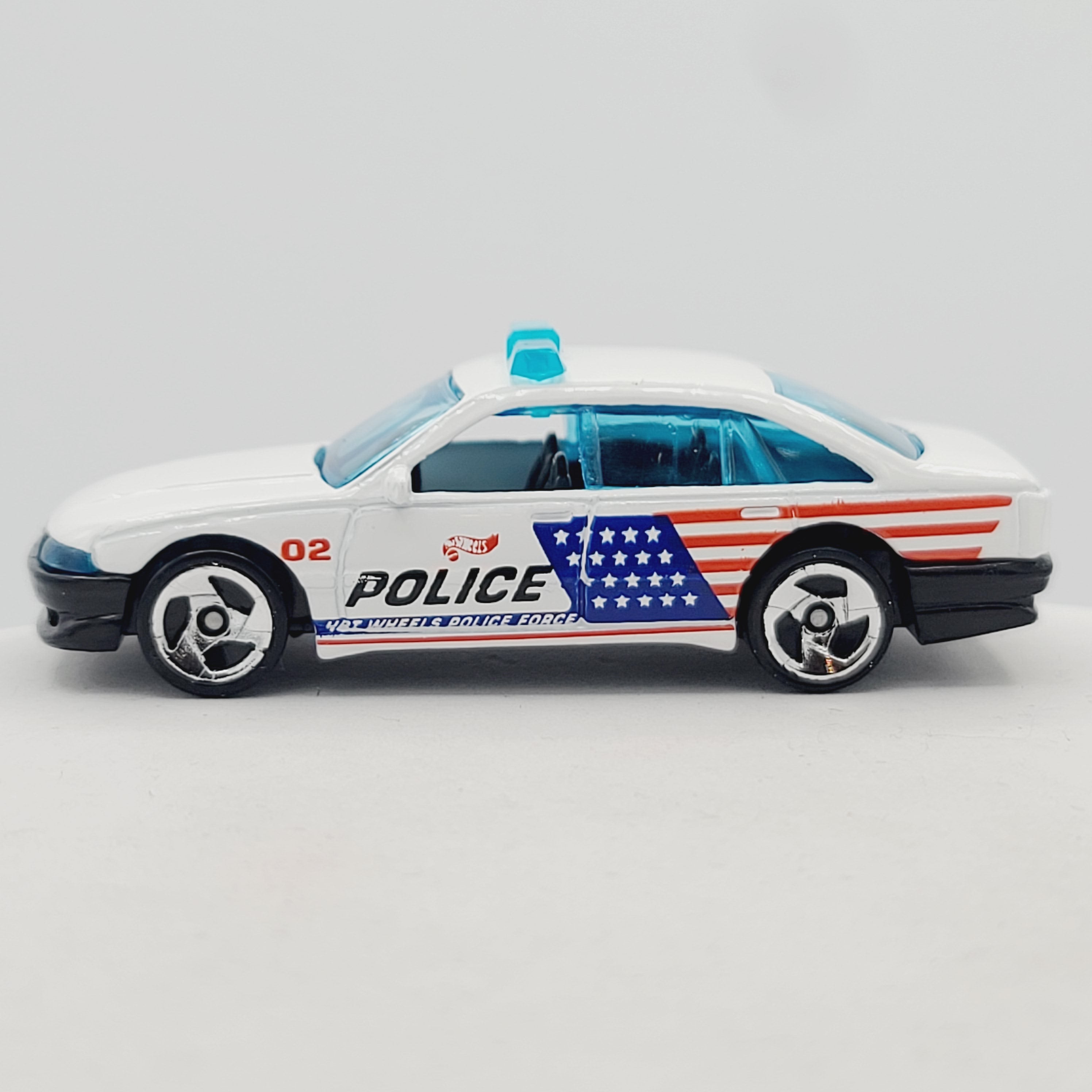 Hot Wheels HW Police Cruiser - Holden Commodore casting (1999 HW Basic)