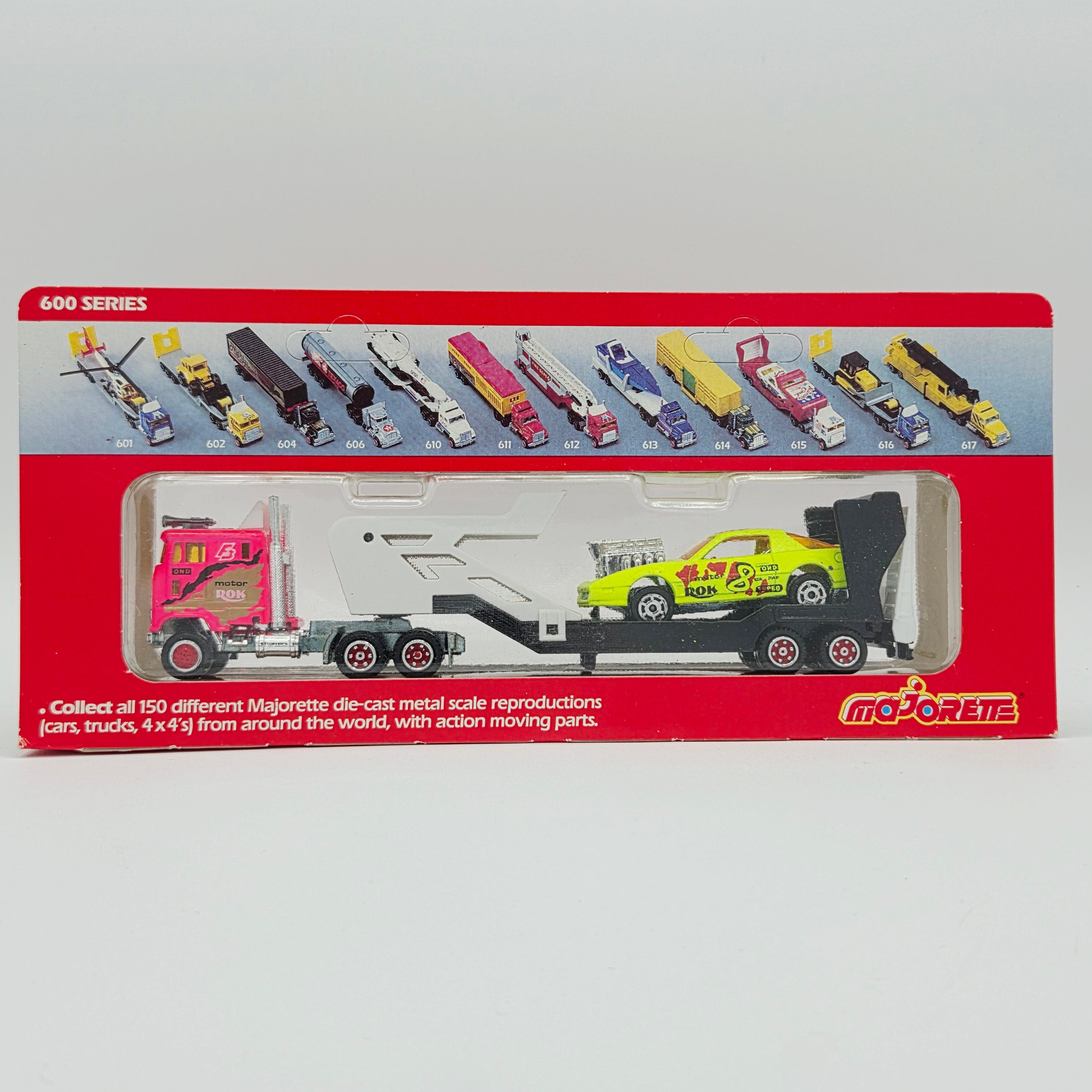 Majorette Ford CL9000 COE Semi Cab Transporter Truck w/ Pontiac Trans Am - 1:87, Unpunched Card (1990s Super Movers 600 Series)