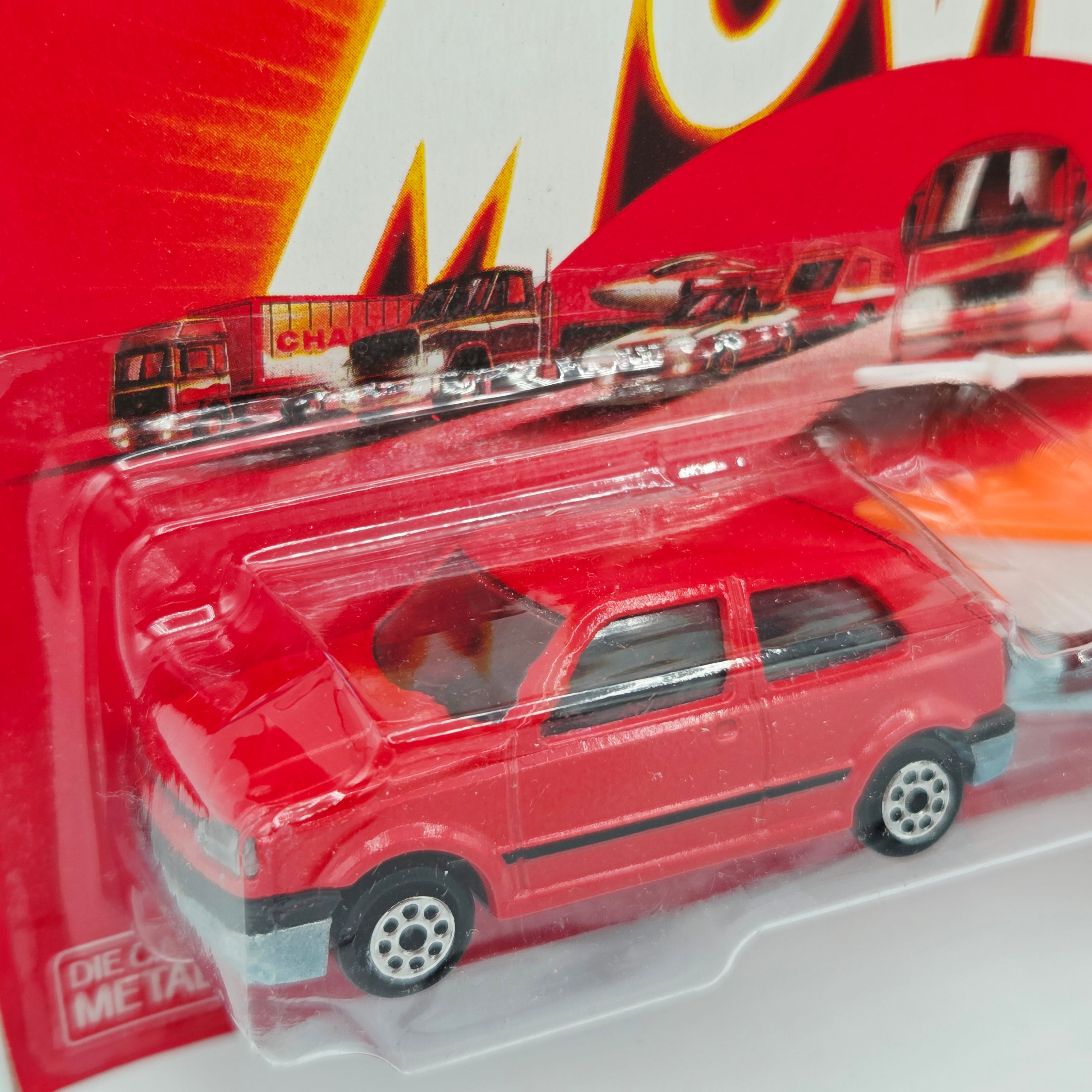 Majorette Volkswagen Golf Sedan w/ Sailboat Trailer #338 (1990s Movers 300 Series)