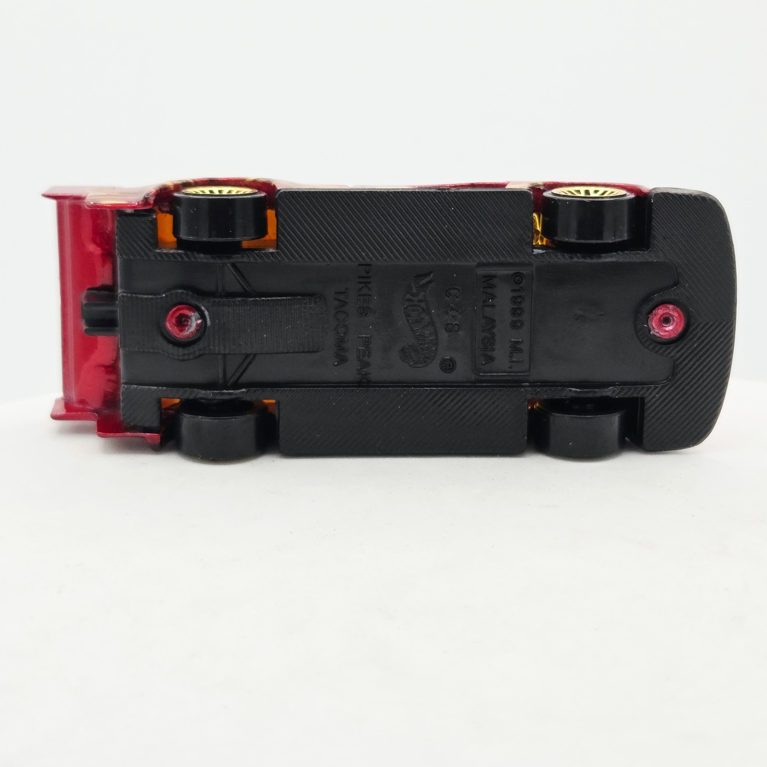 Hot Wheels Pikes Peak Toyota Tacoma (2011 HW Basic - Thrill Racers Volcano)