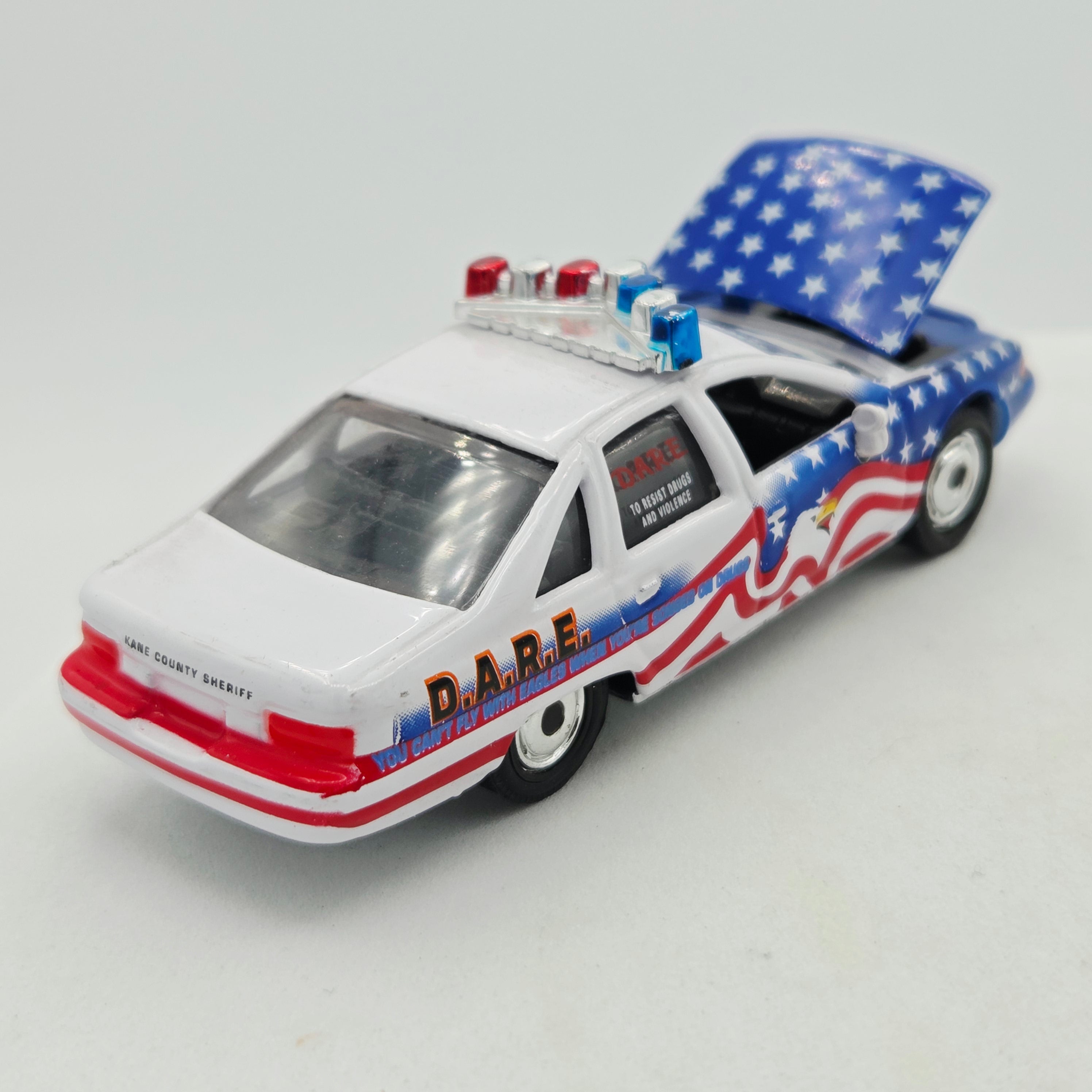 Racing Champions '92 Chevrolet Caprice Police Car - 1:64, DARE (1999 Police USA)