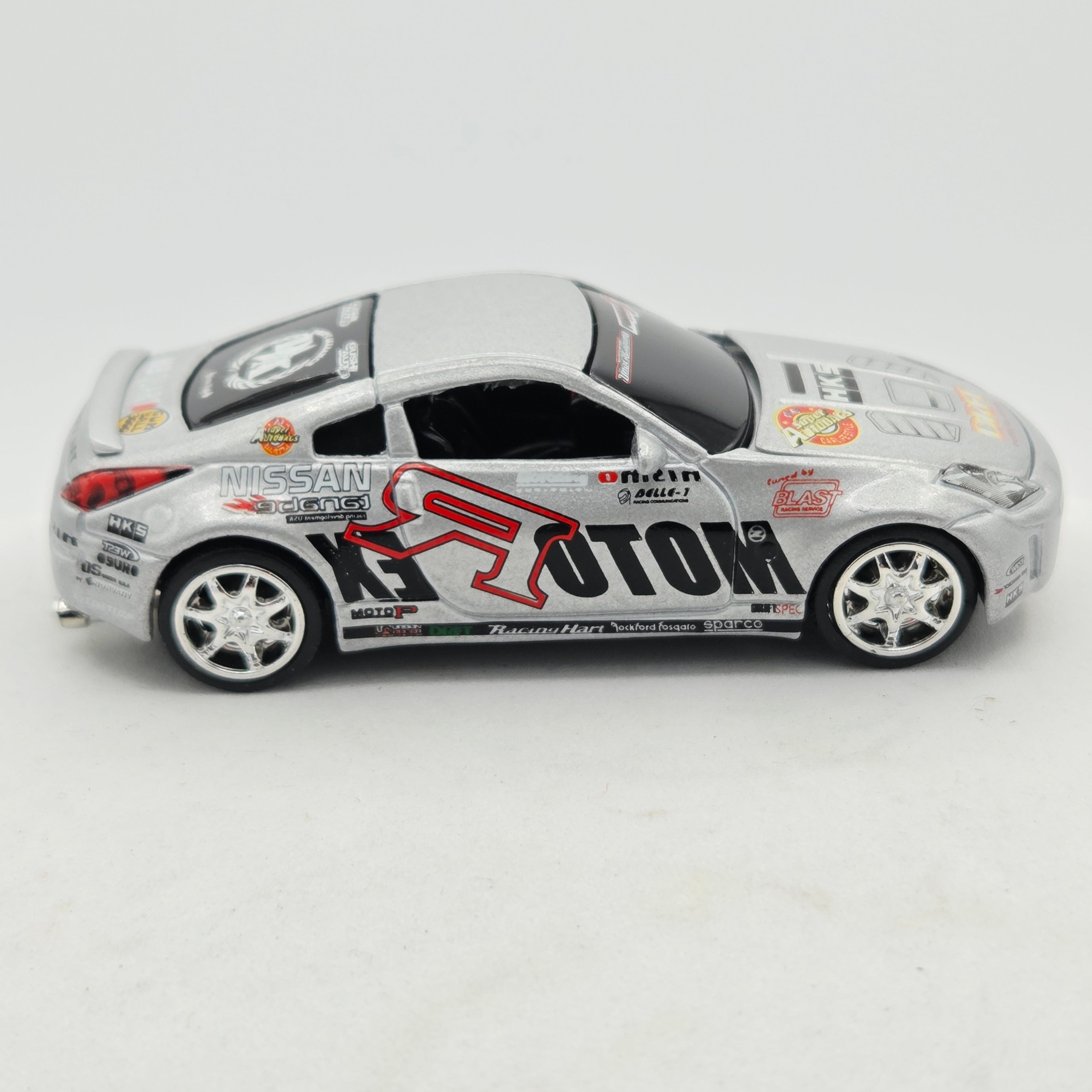 Racing Champions '03 Nissan 350Z - MotorEx HKS - Approx 1:64 w/ Opening Hood (Fast & The Furious)