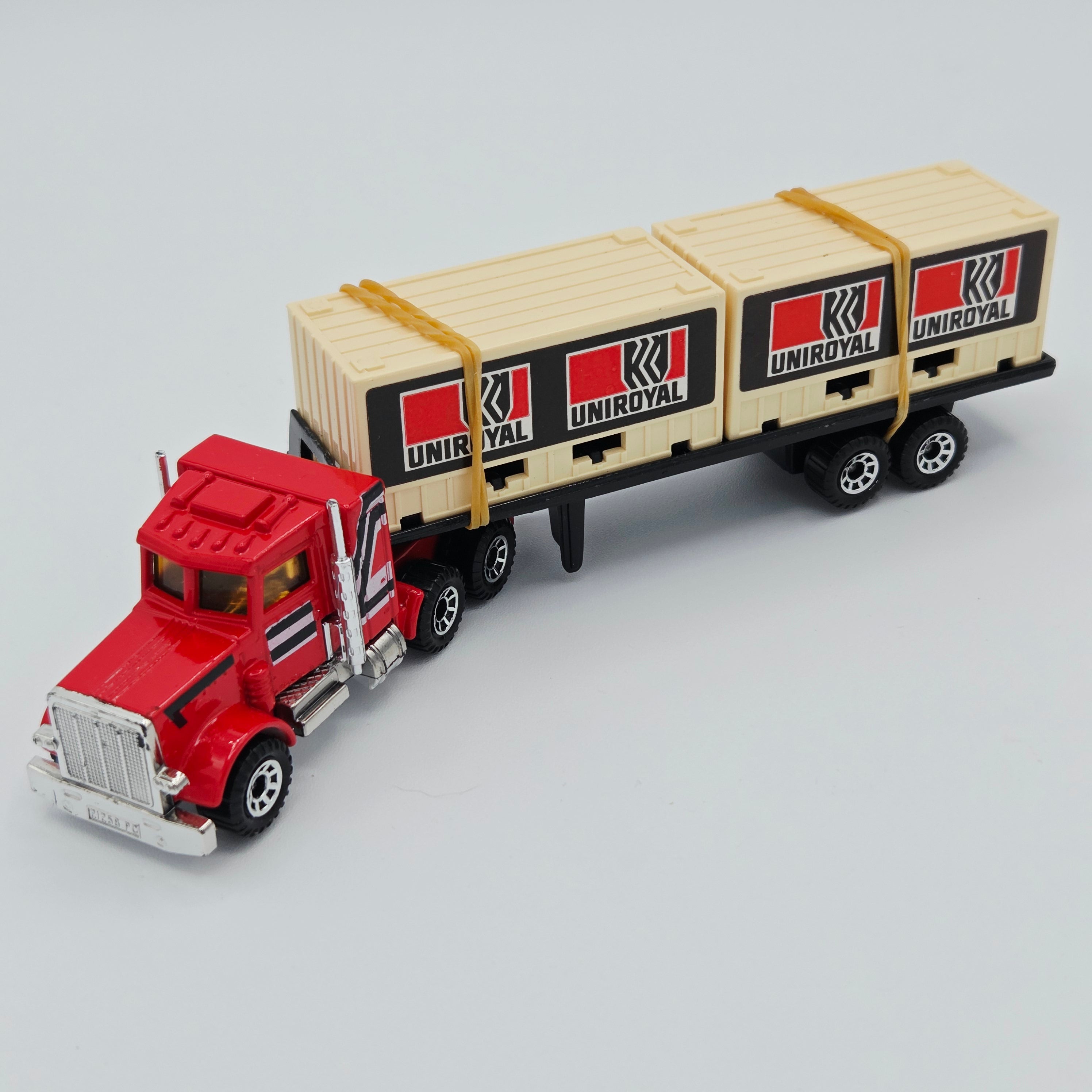 Matchbox Peterbilt i80 Conventional Cab Tractor w/ Container Trailer "Uniroyal" Semi Truck - Lesney England Base (1982 MBX Convoys CY-3)