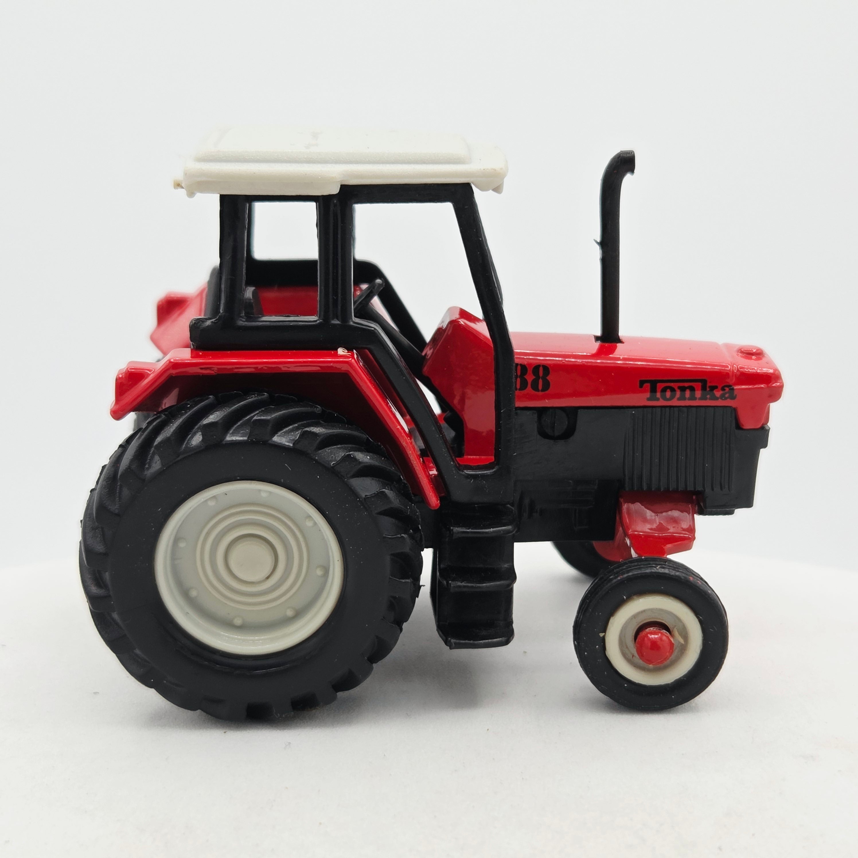 Maisto Tractor - Approx. 1:64, Red (1999 Tonka - Farm Equipment)