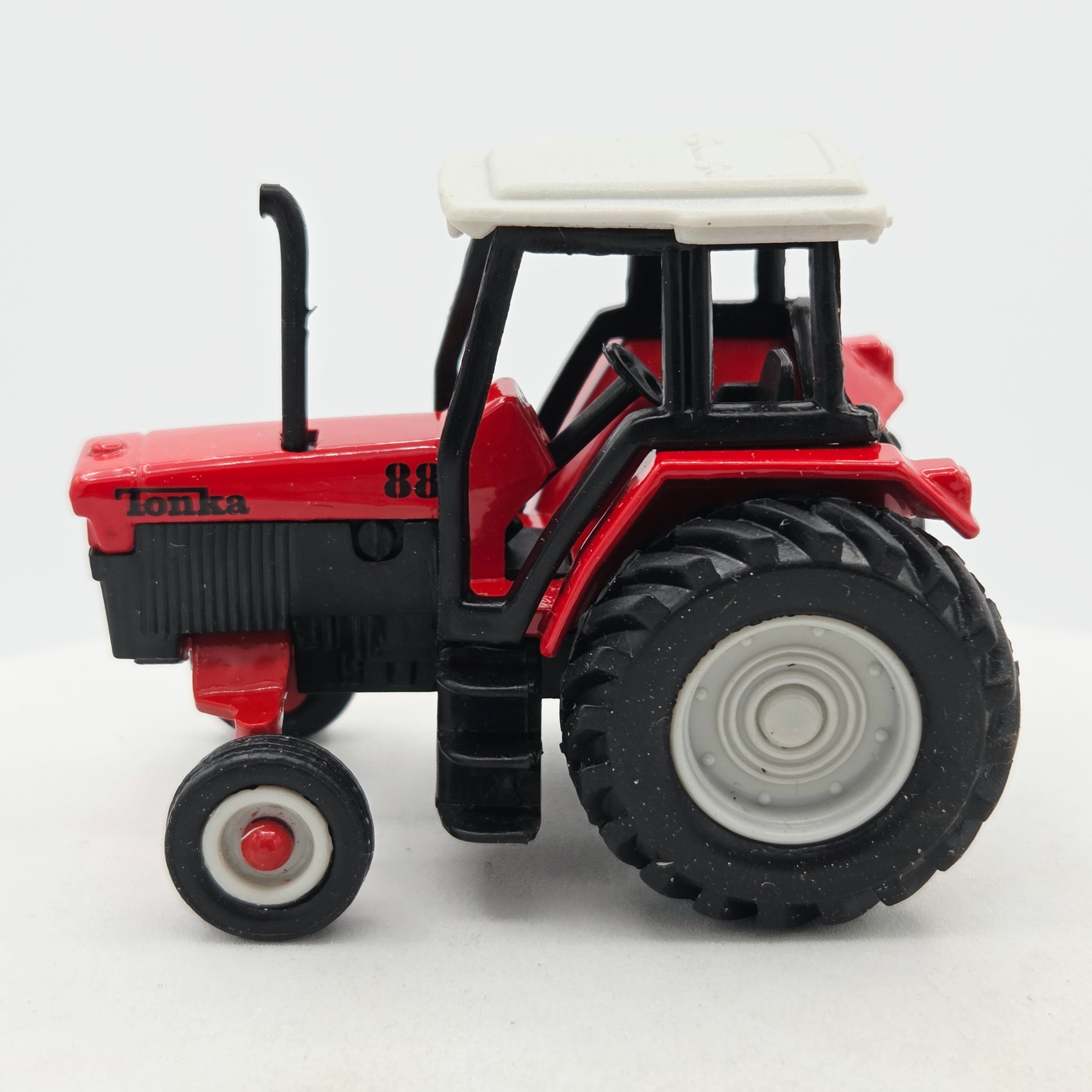 Maisto Tractor - Approx. 1:64, Red (1999 Tonka - Farm Equipment)