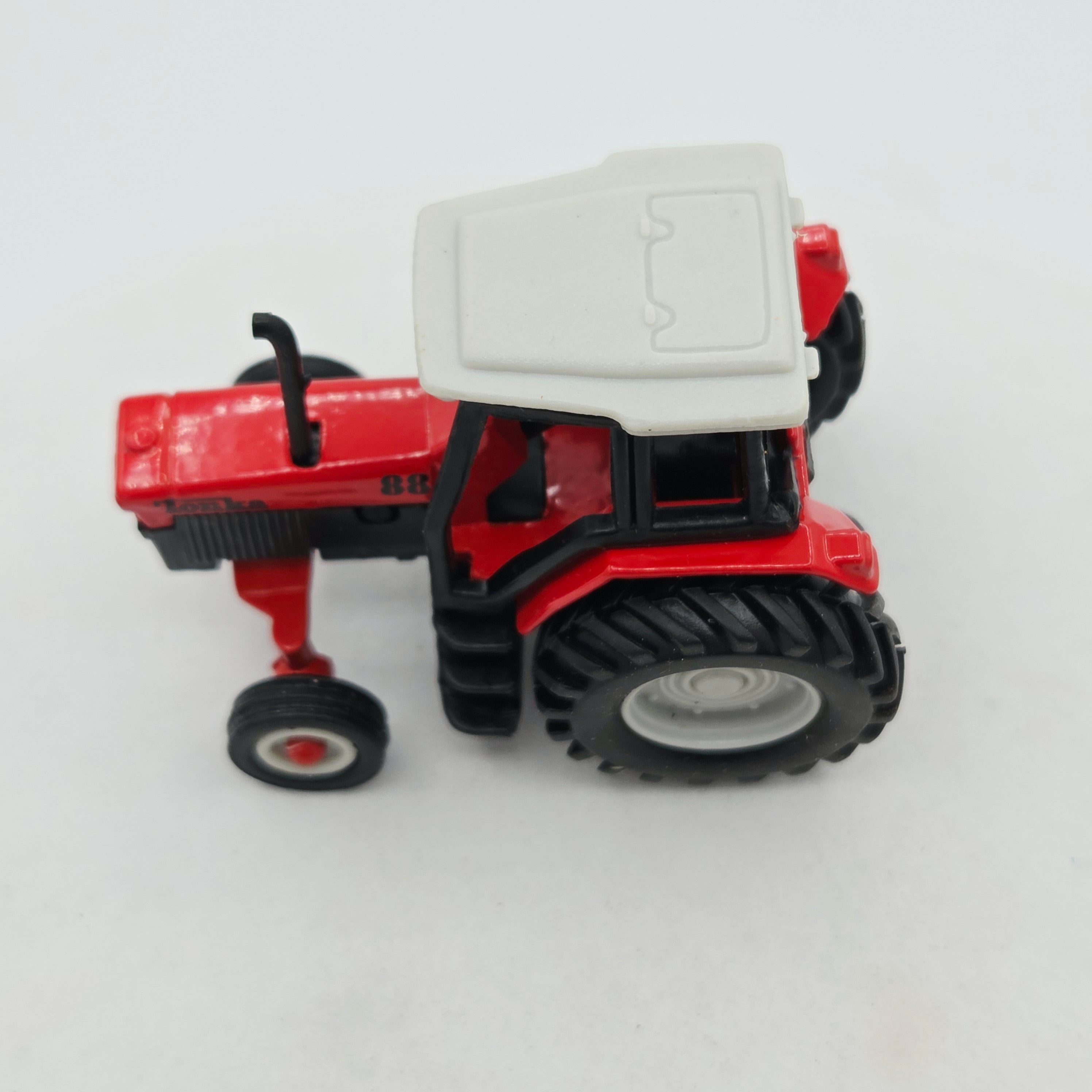 Maisto Tractor - Approx. 1:64, Red (1999 Tonka - Farm Equipment)