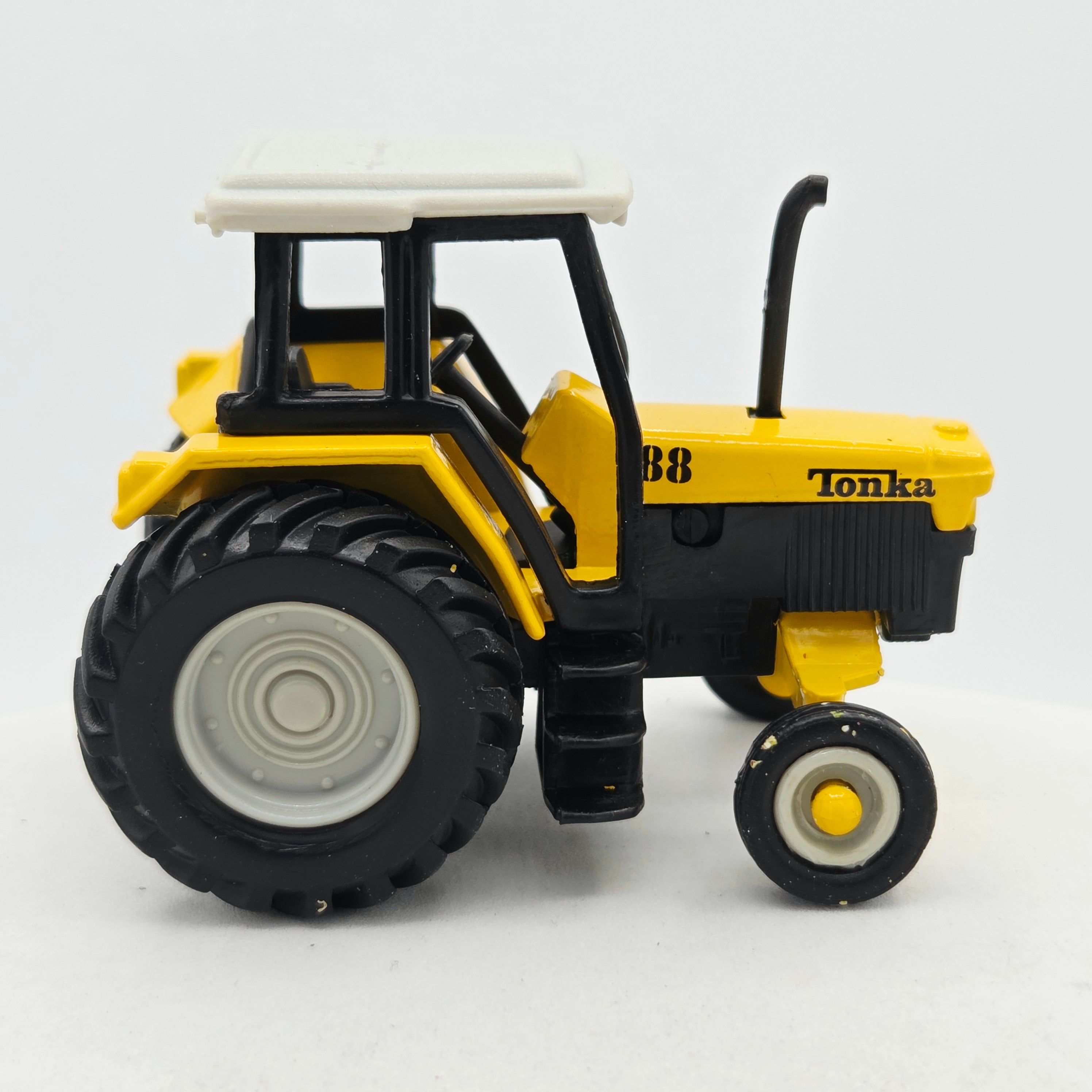 Maisto Tractor - Approx. 1:64, Yellow (1999 Tonka - Farm Equipment)