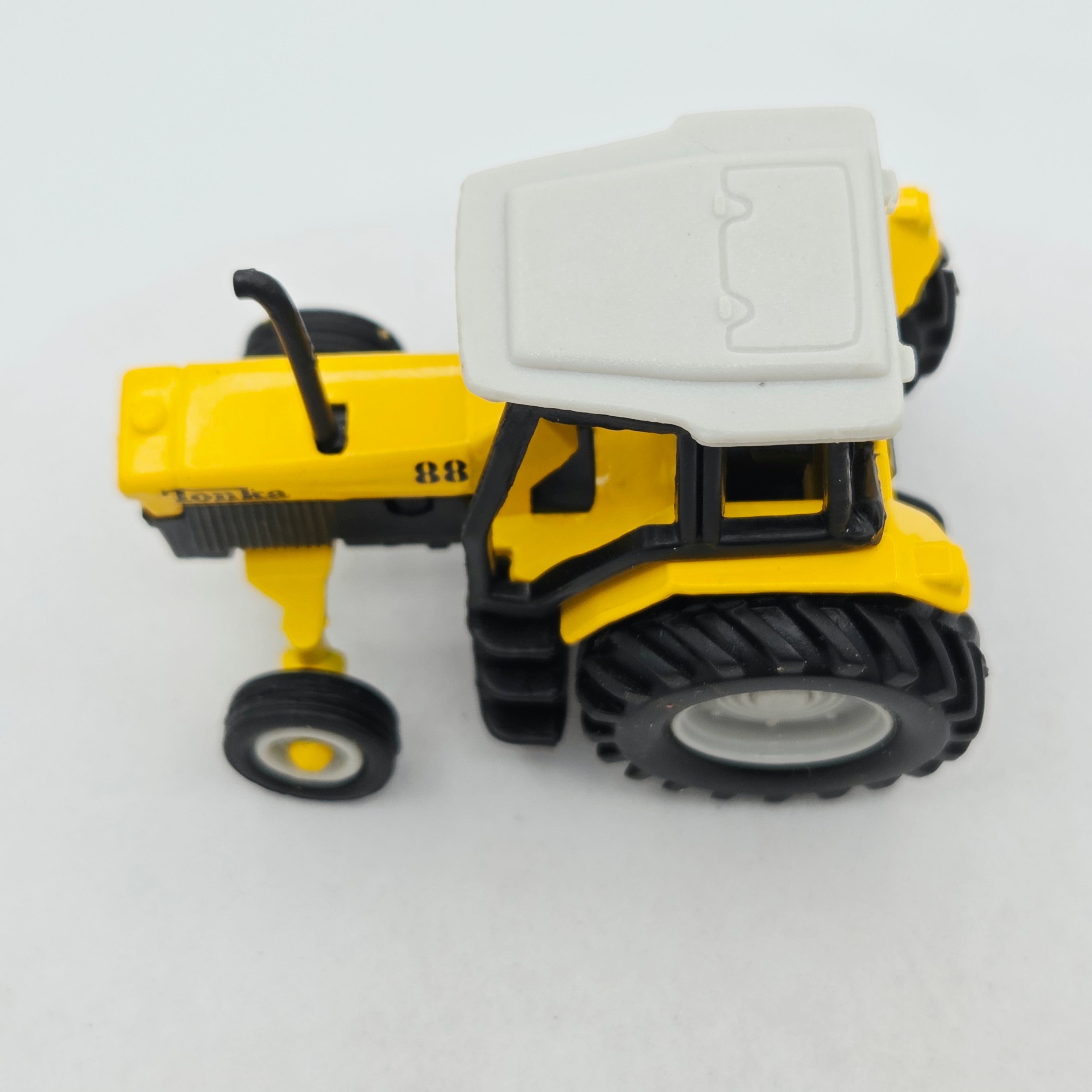 Maisto Tractor - Approx. 1:64, Yellow (1999 Tonka - Farm Equipment)