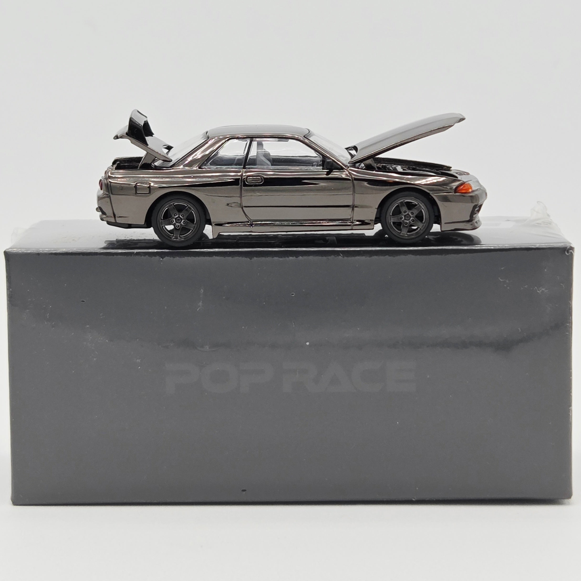 Pop Race Nissan Skyline GT-R R32 - 1:64, Black Chrome (2026 Limited Edition)