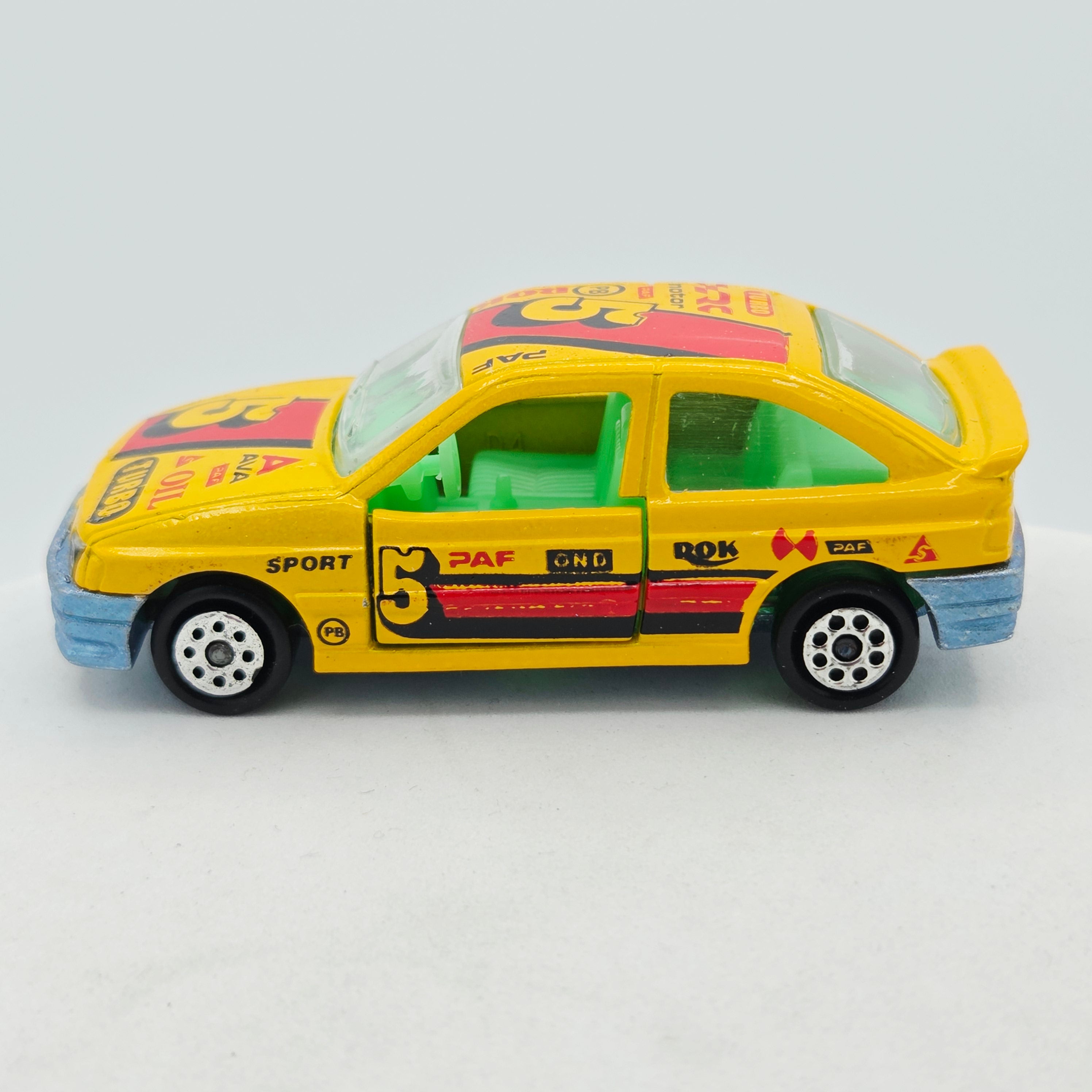 Majorette Ford Escort GT - 1:55, 8 Dot WHL #275 (1993-1998 200 Series)